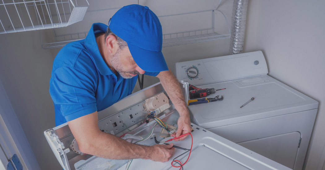 Technician Repairing Washer - Appliance Care LLC